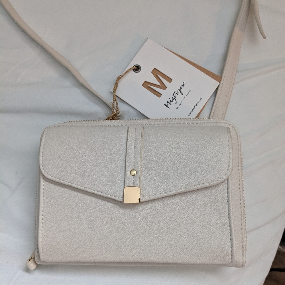 Cream colored brand new purse